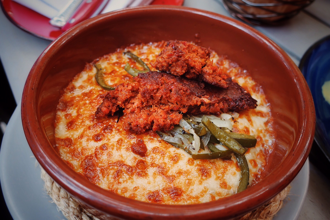 Mi Tocaya Antojeria signature dishes Pato en Mole Almendrado (Duck in Almond Mole)Fried Oyster TacoQueso Fundido con Rajas